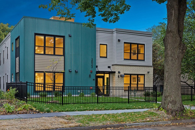 Exterior image of a multifamily building, Credit to Russell Photography