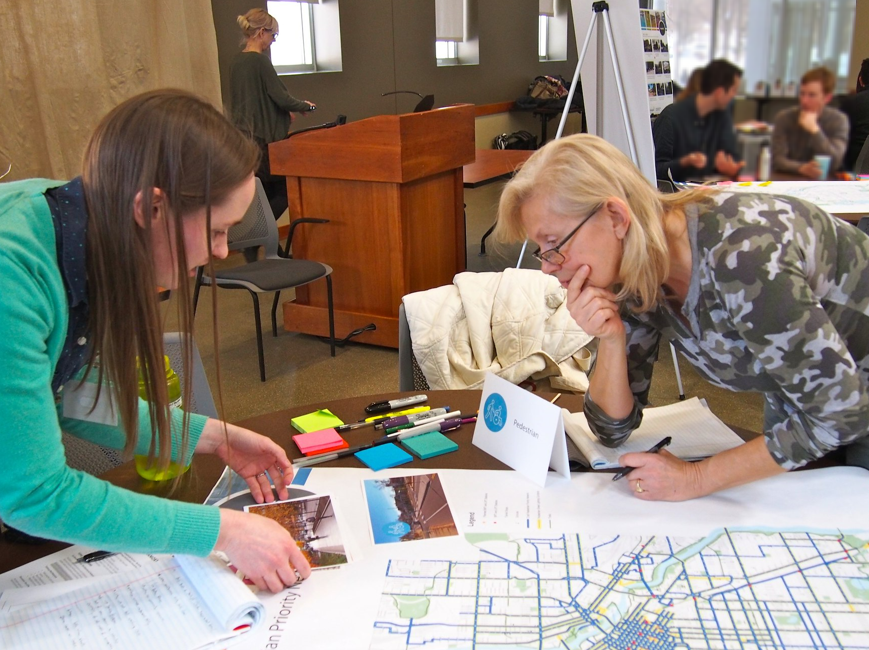 City worker and resident at a workshop.