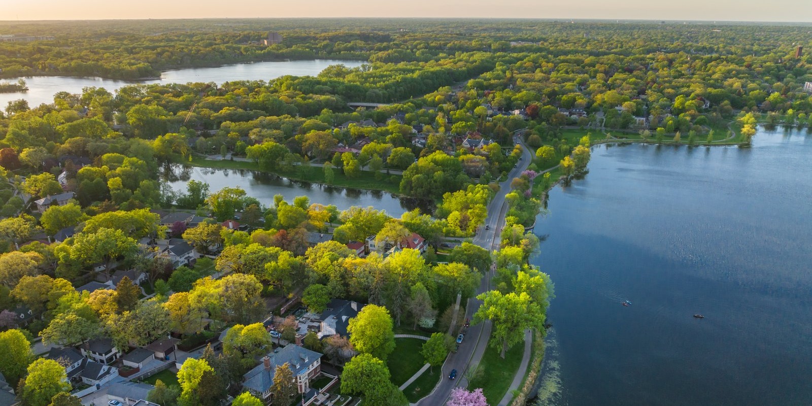 Aerial view of Lake of the Isles and trees. Image courtesy of Meet Minneapolis.