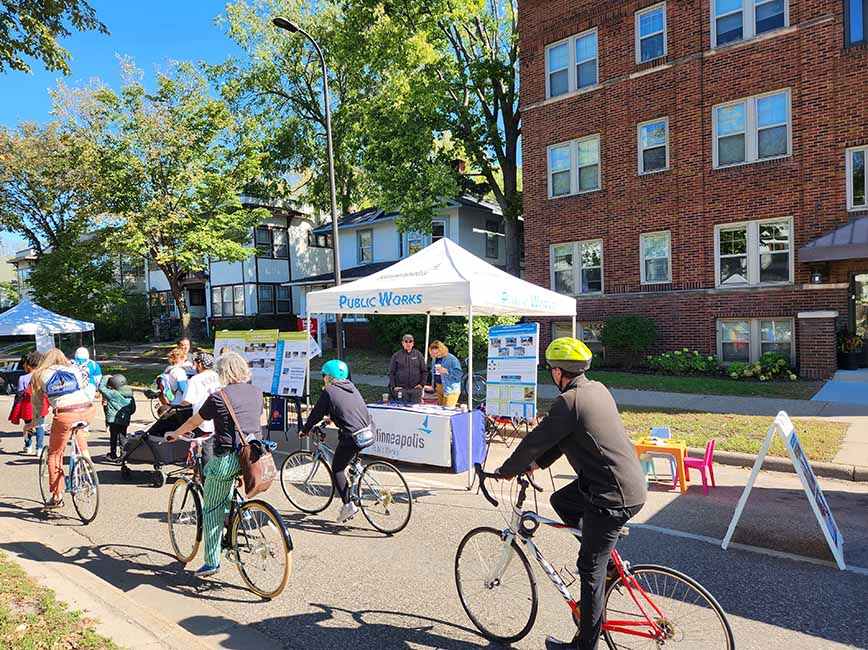 People riding bicycles at an Open Streets event