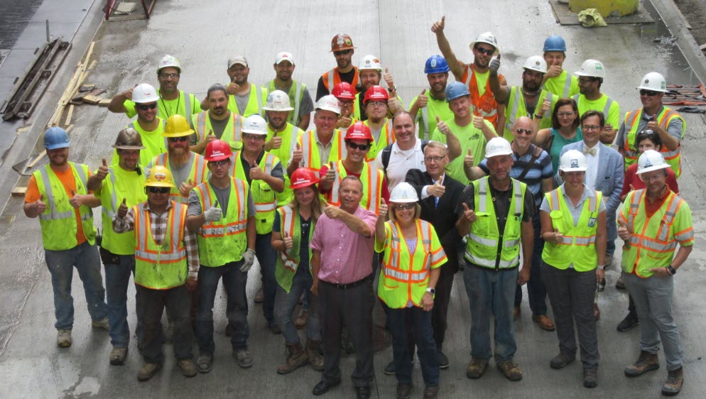 Public Works employees smiling