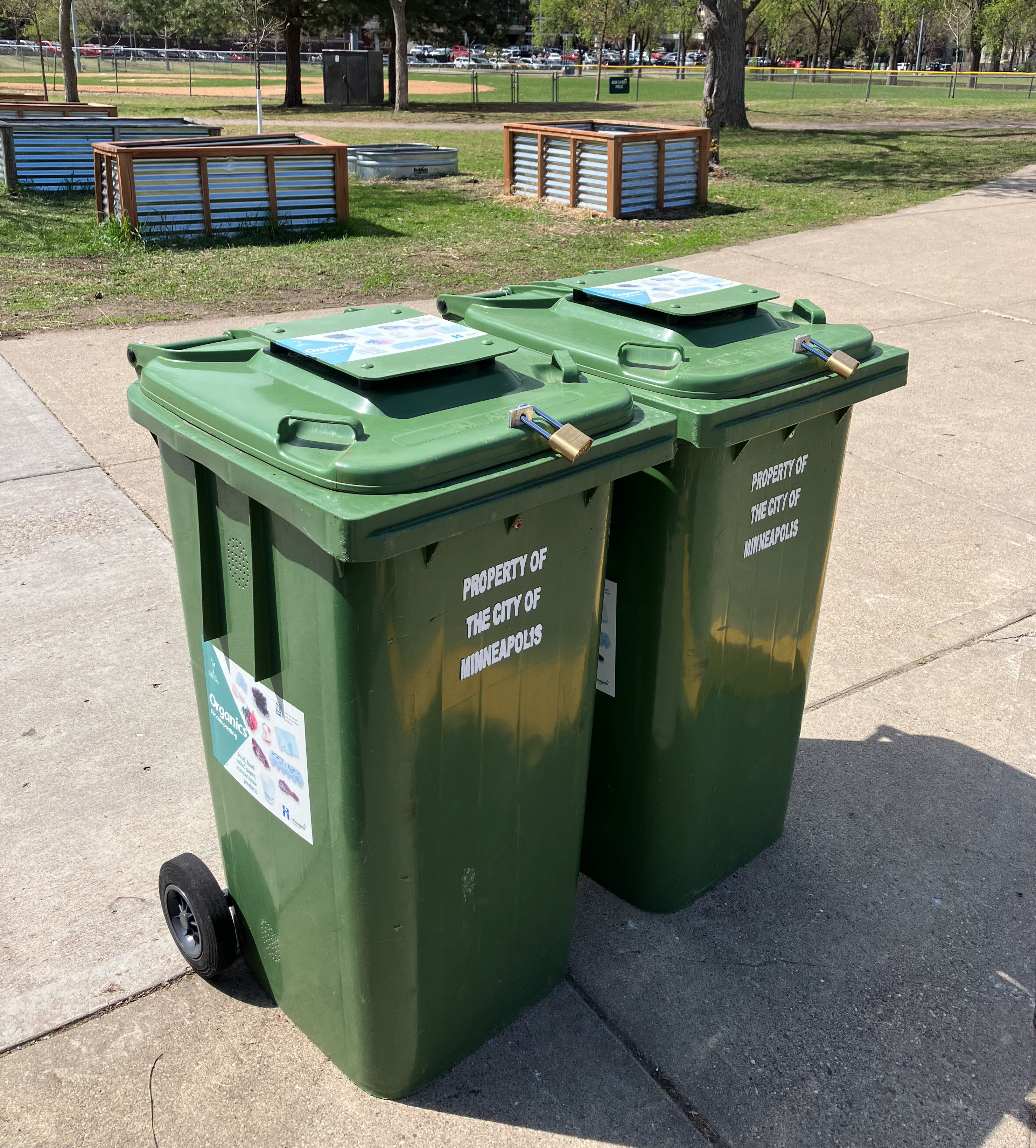organics recycling carts at a drop-of site with 4 digit padlocks on them organics recycling carts at a drop-of site with 4 digit padlocks on them
