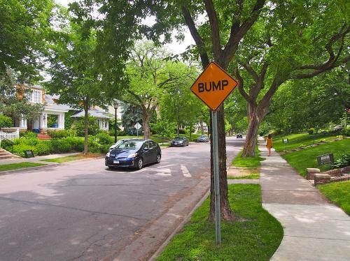 A speed bump on a residential street.