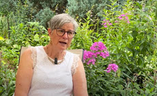 Minneapolis resident talking in outdoor garden