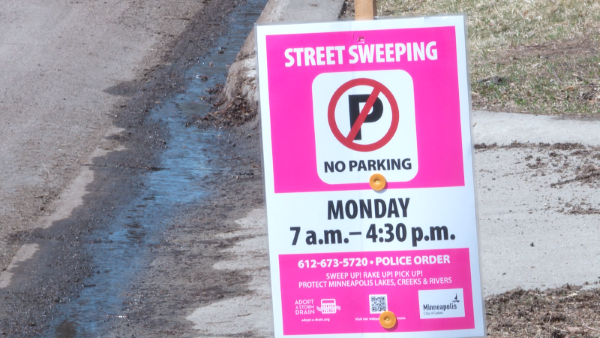 Street sweeping sign. 