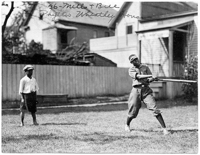 A baseball game at Phyllis Wheatley Settlement House
