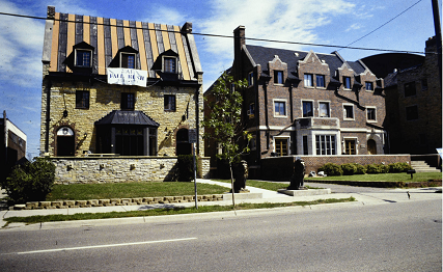 Circa 2000 photo of two houses on Fraternity Row