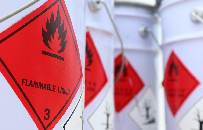 Flammable liquid sign on pails