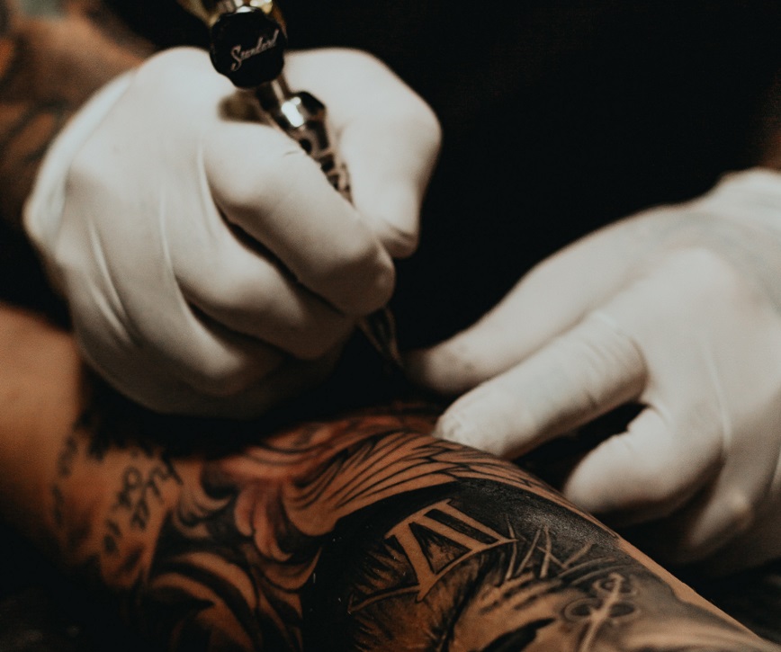 Person receiving a tattoo