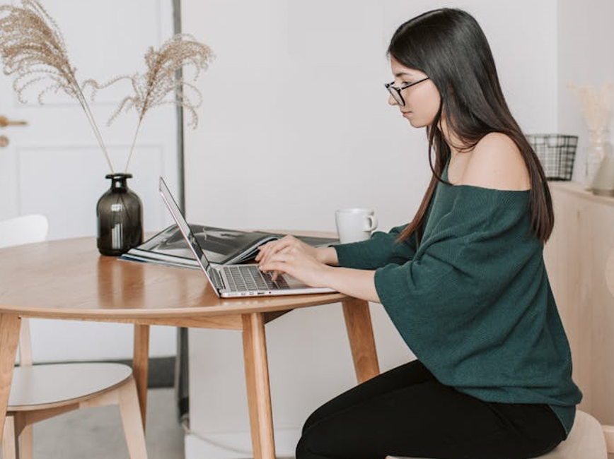 Person working at laptop at home