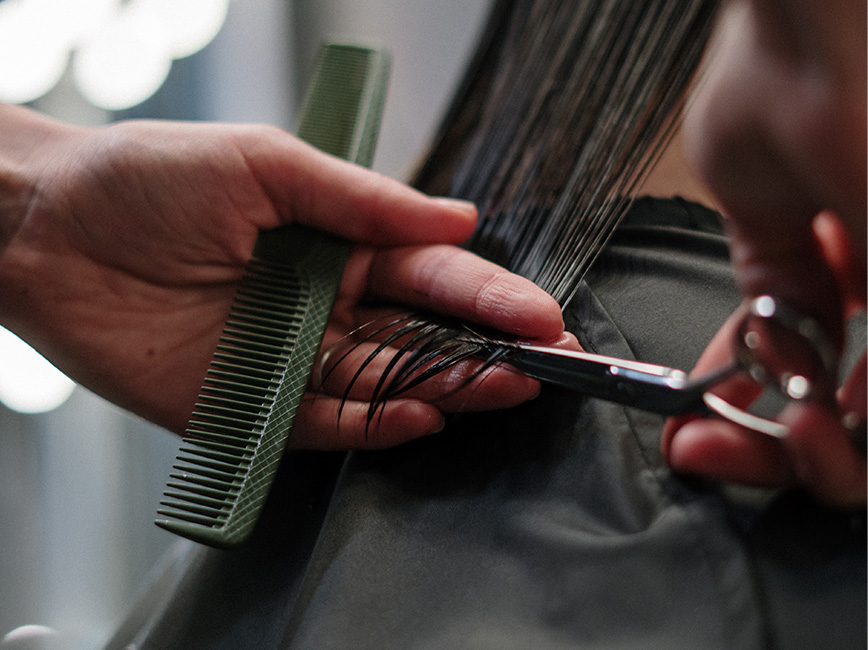 person cutting hair