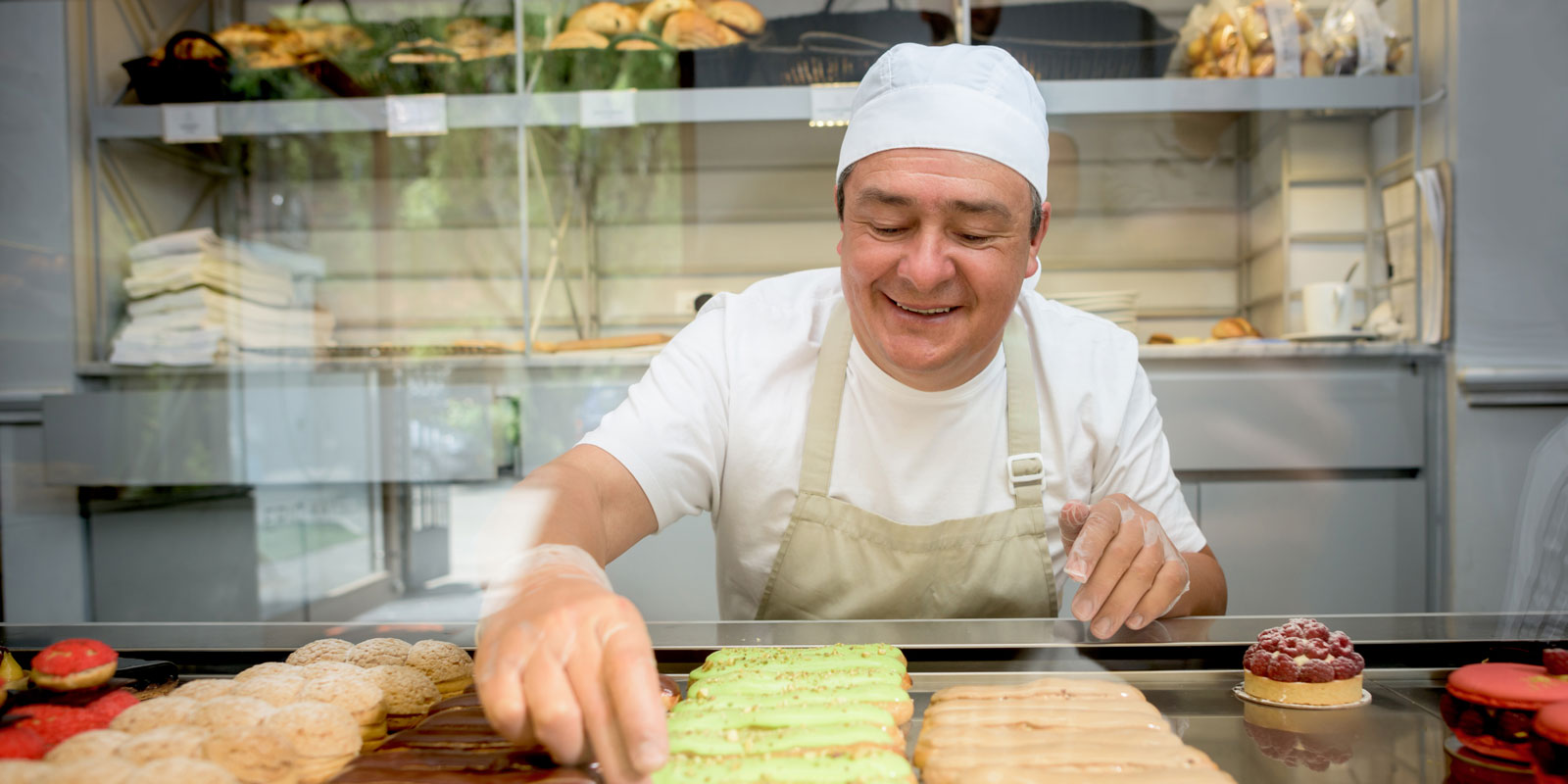 Chef arranging pastries