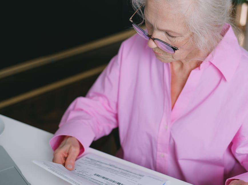 Person reading notes on paper