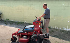 Person on riding mower